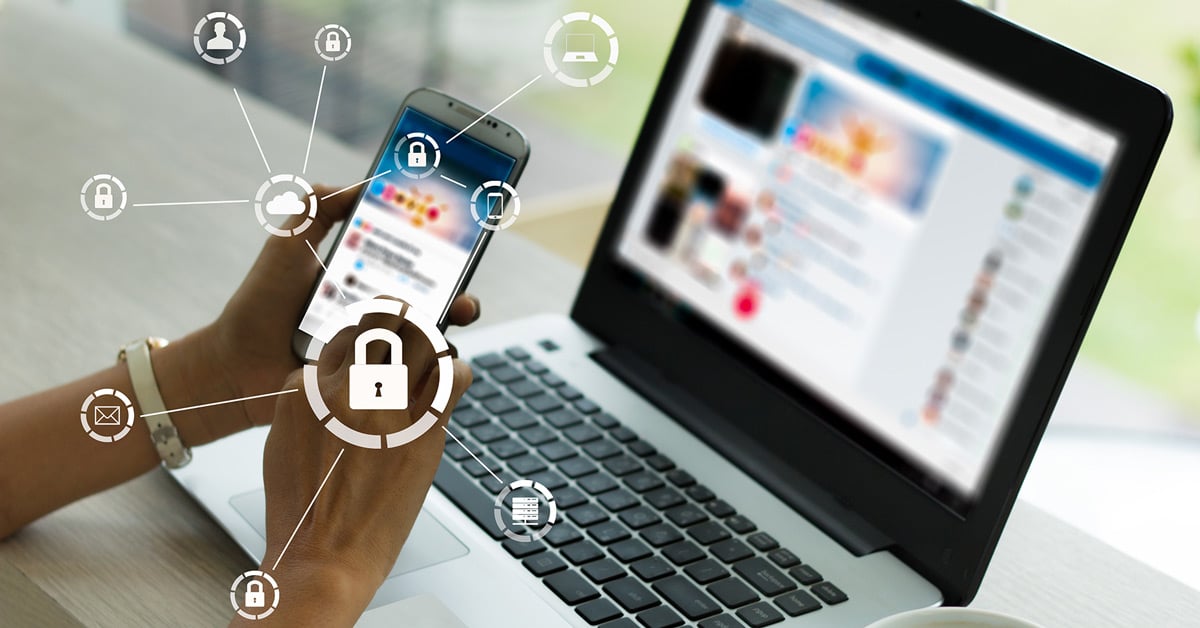 Viewing social media on a mobile device and laptop with security icons overlayed